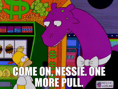 Homer Simpson and the Loch Ness Monster playing a slot machine: "Come on Nessie, one more pull."